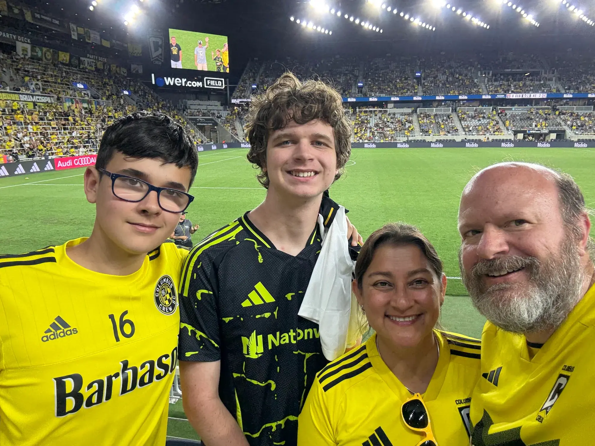 A host family at a Columbus Crew match