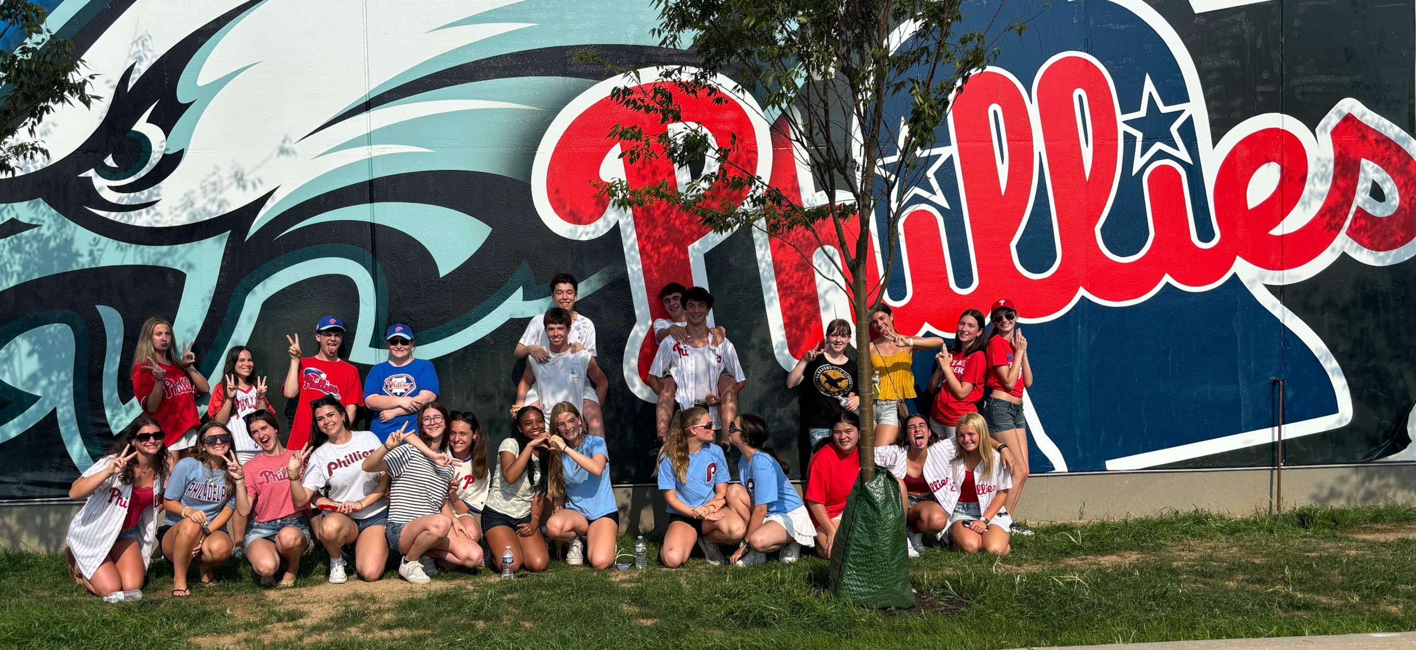 Exchange students in front of the Phillies mural in Philadelphia